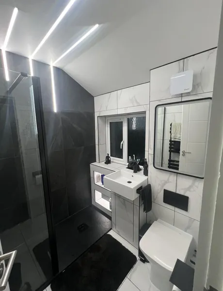 LED strip lighting installed in a modern bathroom by a Preston electrician