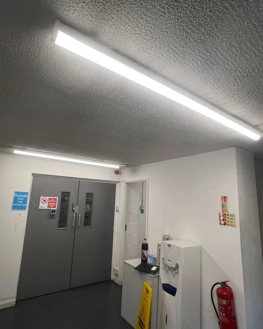 Commercial LED batten lighting fitted in a corridor: electrician in Fulwood