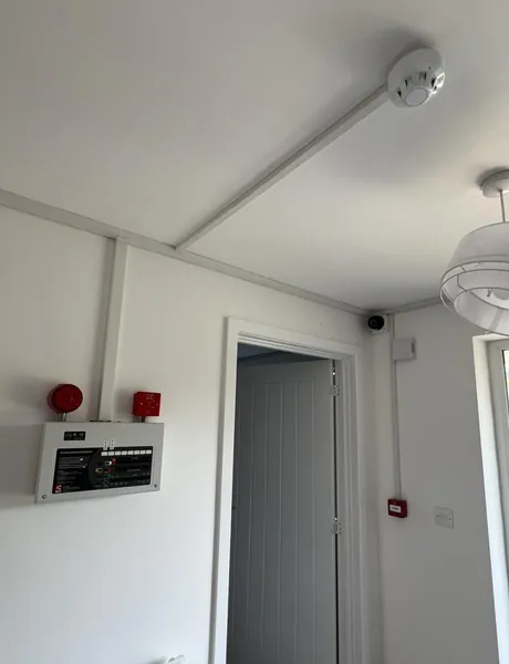 Fire alarm panel and smoke detector installed by K Volts Electrical in Preston