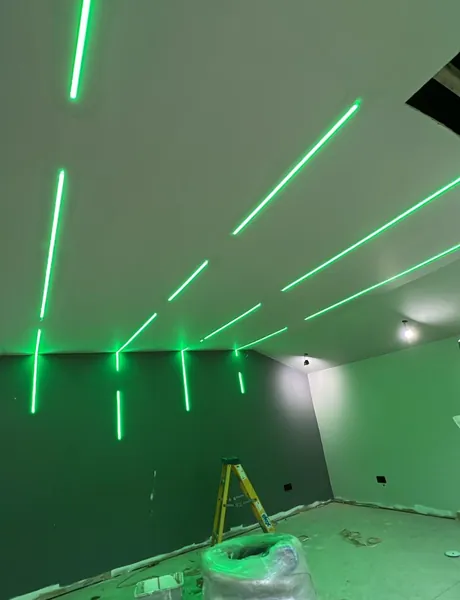 Green LED strip lighting installed by a Preston electrician
