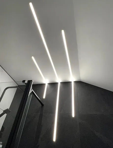 Recessed LED profile lighting along a stairwell installed in Preston