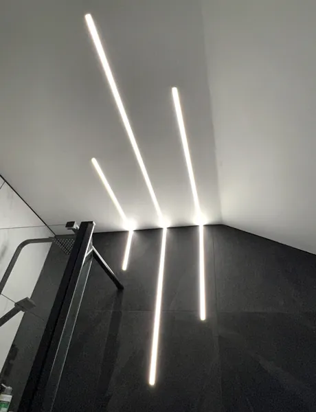 Linear LED lighting above a staircase in Preston