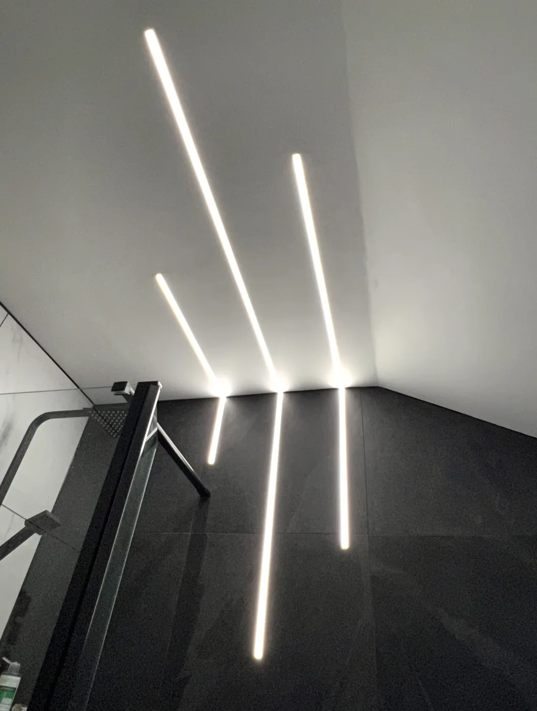 Linear LED lighting above a staircase: electrician in Longridge