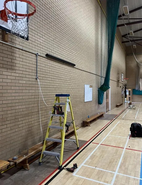 Electrical installation in a school sports hall in Preston